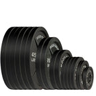 A set of black cast iron Olympic weight plates in descending sizes, labeled with weights from 45 lb to 5 lb 2 1/2 lb, with text reading 'OLYMPIC PLATE SET CAST IRON 455 lb. Plate Set' at the top.