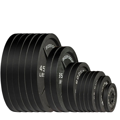 A set of black cast iron Olympic weight plates in descending sizes, labeled with weights from 45 lb to 5 lb 2 1/2 lb, with text reading 'OLYMPIC PLATE SET CAST IRON 455 lb. Plate Set' at the top.