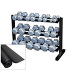 Set of hexagonal dumbbells on a metal rack with a black mat below.