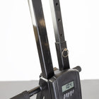 Digital weight display on a climber with a white background