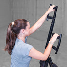Woman using Best Fitness BFMC10B Mountain Climber