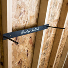 Body-Solid Foam Mat Wall Hanger attached to a wooden wall.
