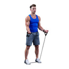 Man exercising with resistance bands on a white background