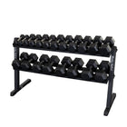 Black hexagonal dumbbells on a metal racks on a white background