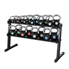 Kettlebell set with a black metal rack on a white background