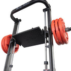 Body-Solid weight rack with red weights on a white background