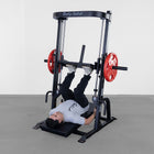 Person using a Body-Solid weight machine in a gym setting