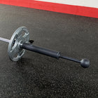 Body Solid LMCG Rotational Club Grip Attachment on a black floor with red border