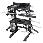 Black and silver weightlifting stand with various attachments on a white background