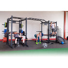 People exercising with weightlifting equipment in a gym.