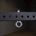 Metal bracket with a ring on a dark background