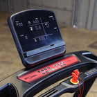 Treadmill console with digital display and control panel on a treadmill.